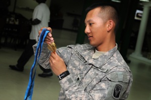 Olympians Share Medals With Troops Overseas